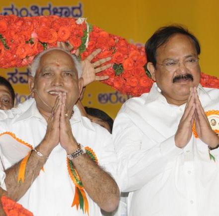 B S Yedduyurappa, with BJP leader Venkaiah Naidu