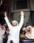A Kuwaiti demonstrator shouts as he and others gather inside the National Assembly
