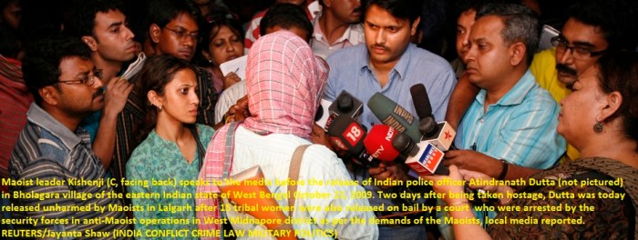 Maoist leader Kishenji speaks to the media in Bholagara village