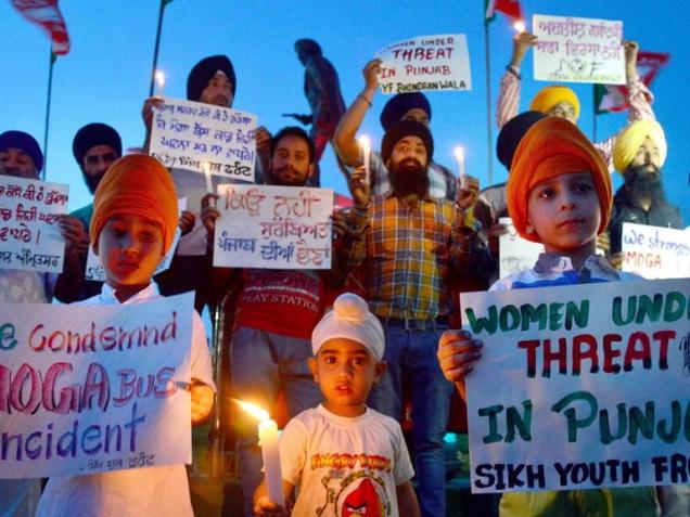 Candle light vigil aganist Moga molestation