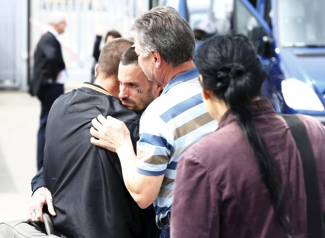 Relatives welcome Swiss survivors of Saturday's earthquake in Nepal after their arrival at Bern airport