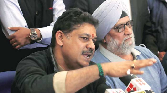 Kirti Azad and Bishan Singh Bedi at a press conference in New Delhi